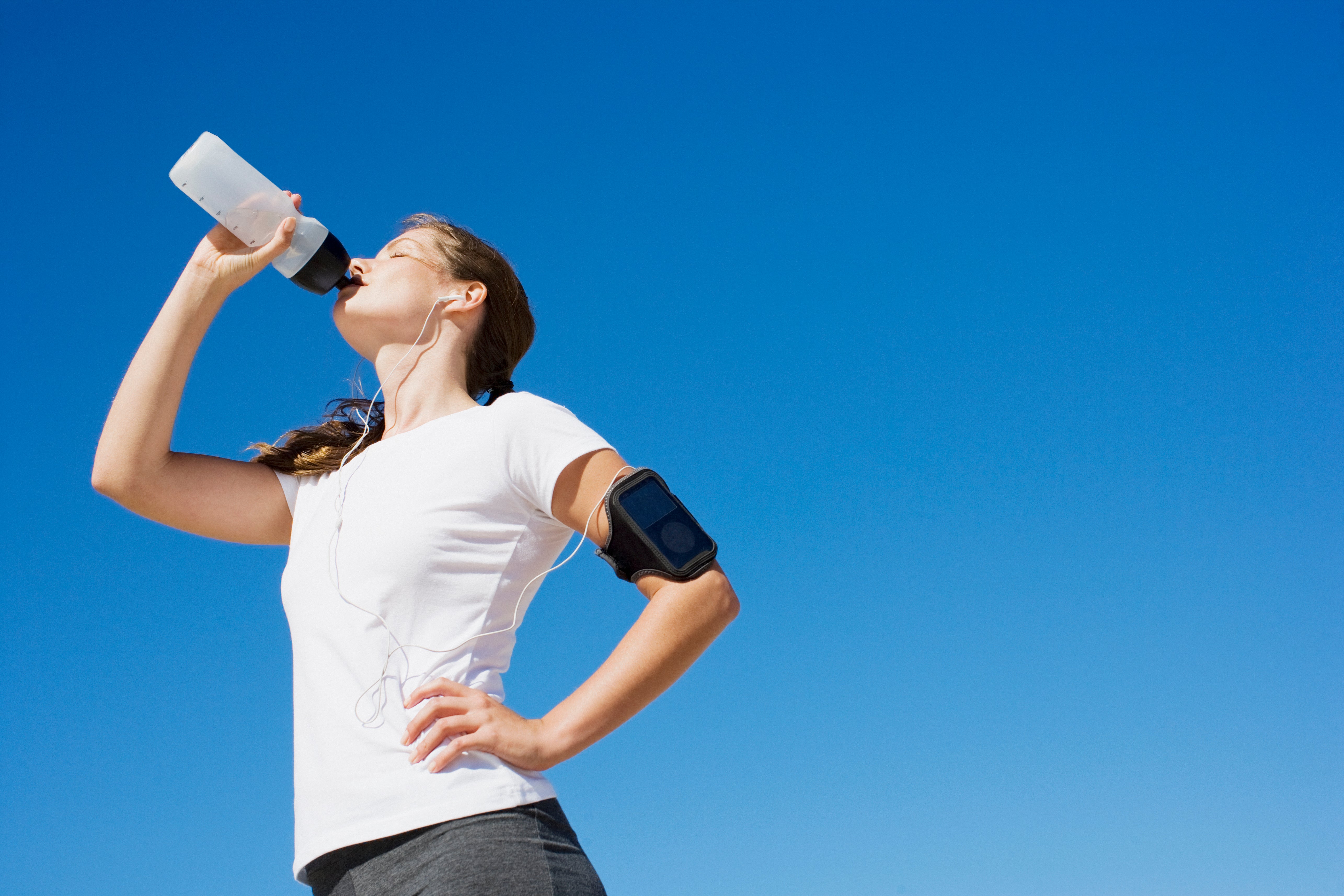 woman drinking healthy hydration